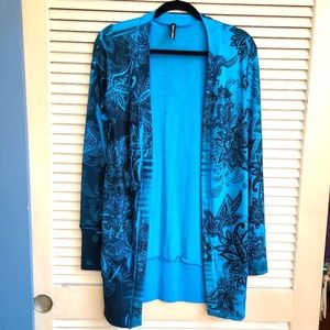 Blue cardigan sweater with black with purple accent pattern